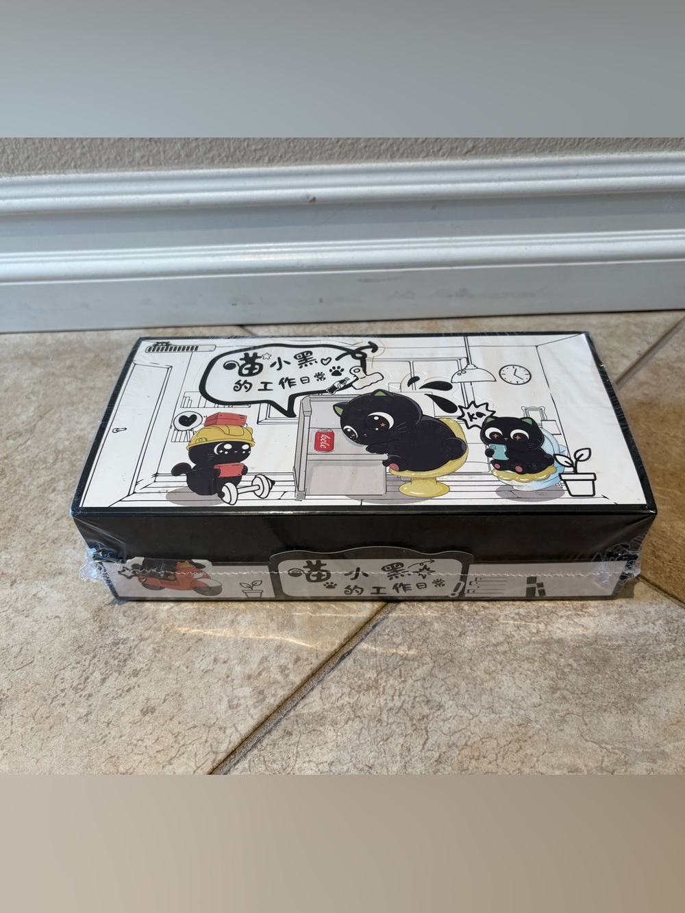 1 case Little Black's daily work routine figurine blind box.